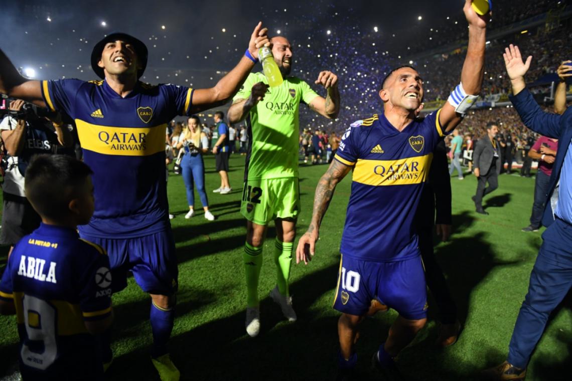 Imagen Marcos Díaz, Wanchope y Carlitos celebran el título